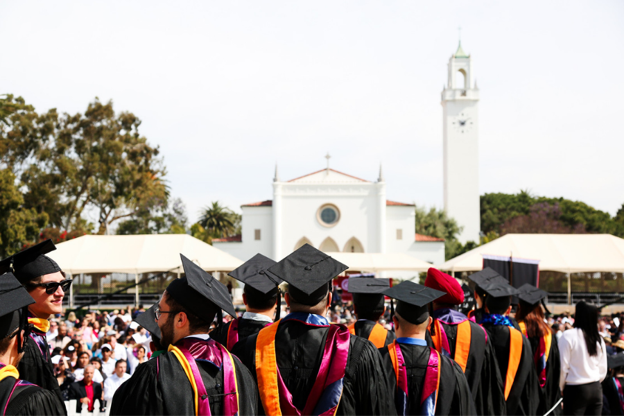LMU commencement photo with Sacred Heart Chapel